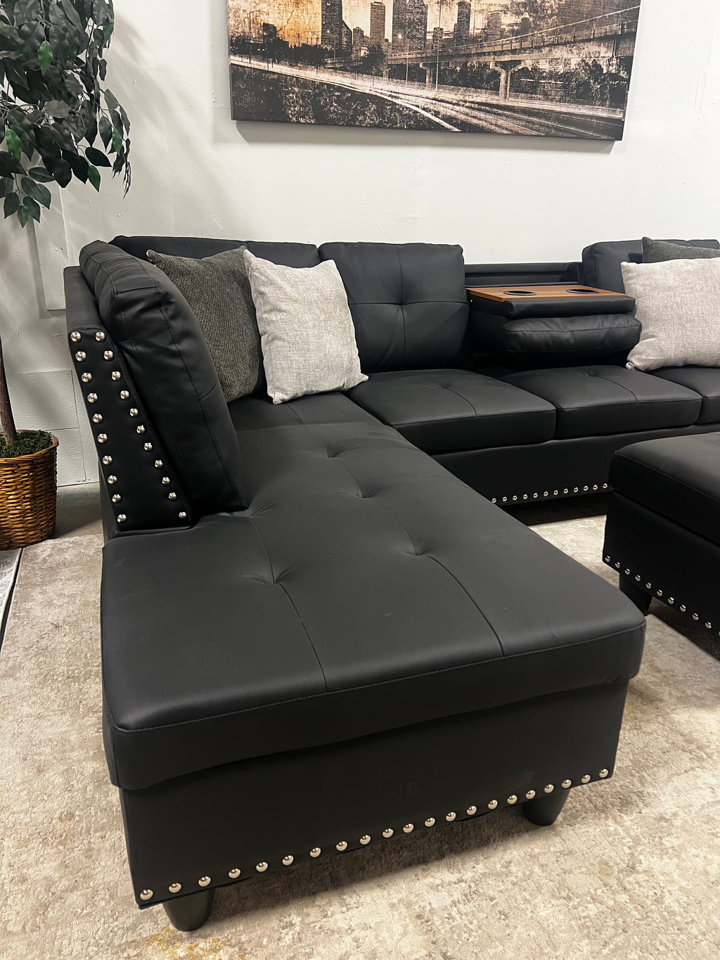 Faux Leather Sectional with Pull-Out Cupholders & Storage Ottoman