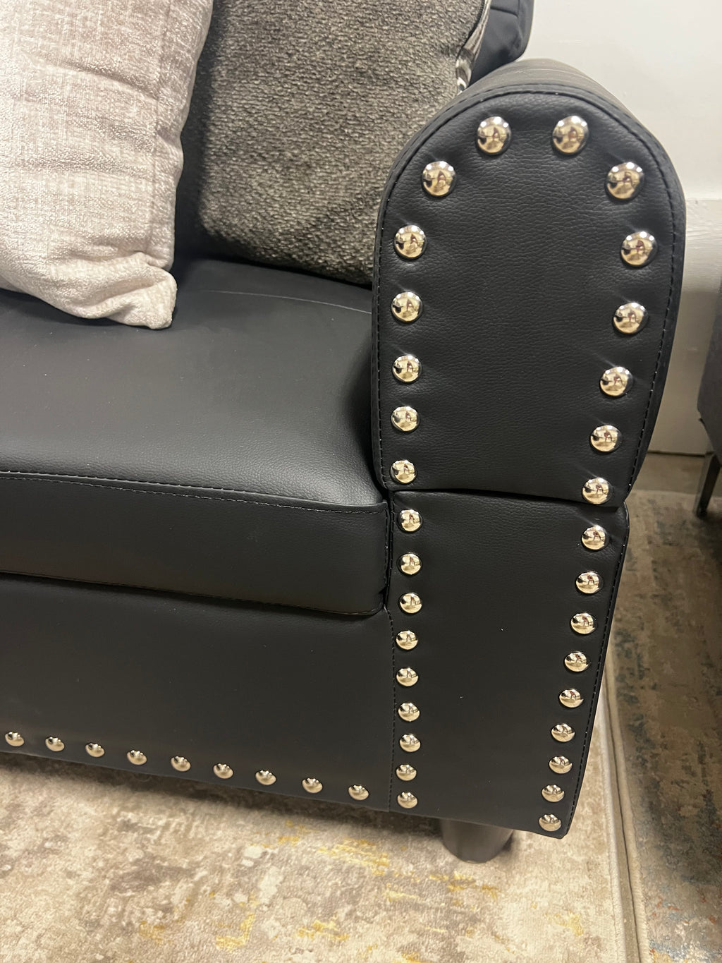 Faux Leather Sectional with Pull-Out Cupholders & Storage Ottoman