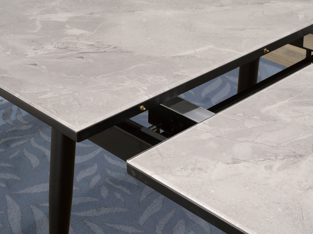 EXT. DINING TABLE - DARK GREY