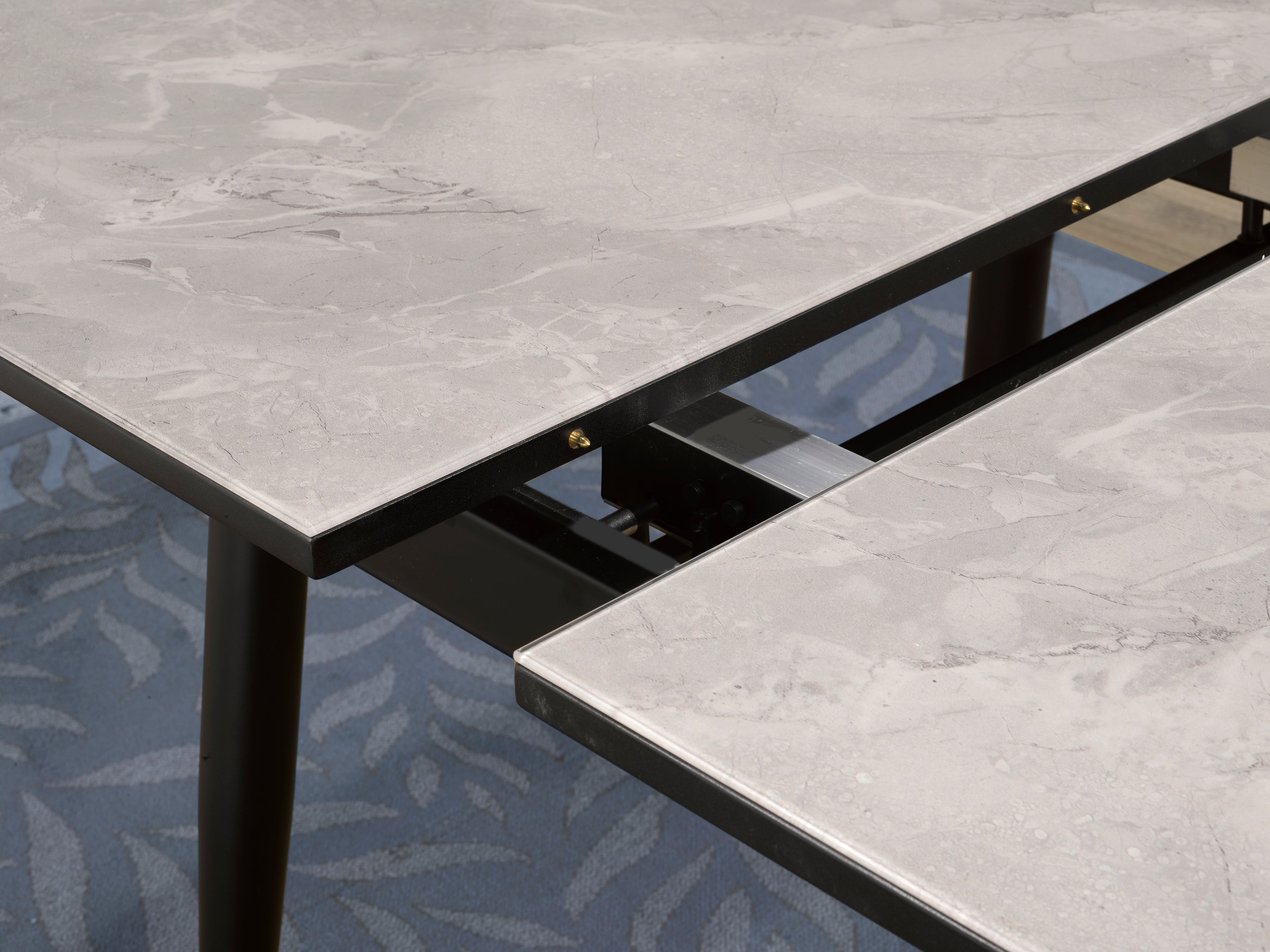 EXT. DINING TABLE - DARK GREY